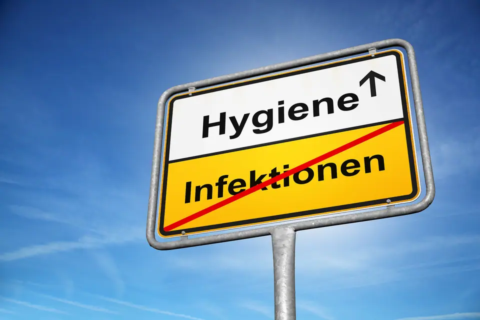 Grafik im Stil eines Ortsschilds: Hygiene statt Infektionen